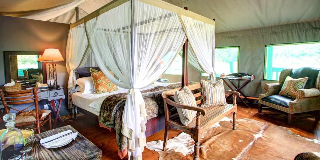 Suites feature a colonial theme with 4-poster beds draped with mosquito nets